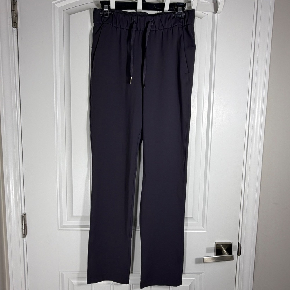 Lululemon On the Fly Pant 7/8 Luxtreme Dark Purple Plum Drawstring Trousers 6
